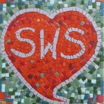 A kiss in Welsh is a sws